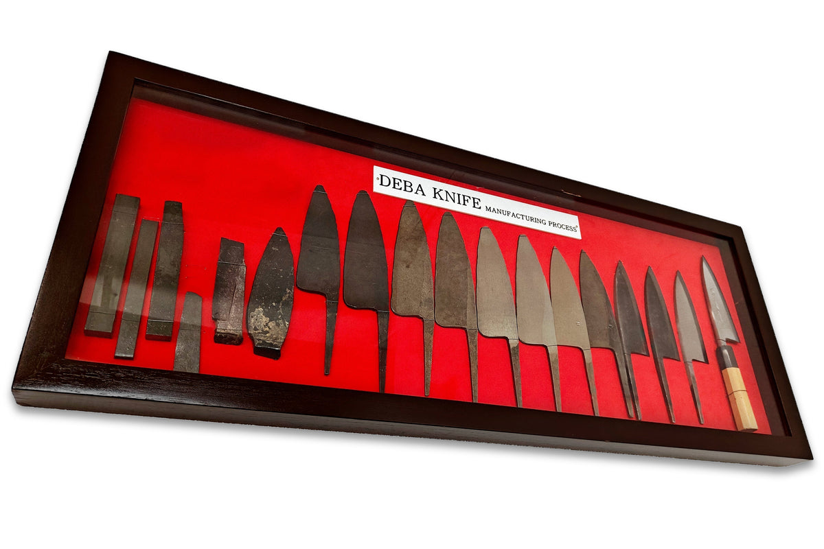 Deba knives shown at various stages of the forging process
