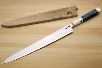 Sujihiki slicer knife with blue stabilized handle and light wood saya, side view