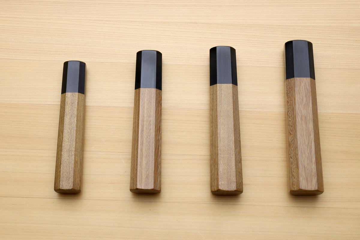 Four wooden petty knife handles with ebony bolster bands, ambrosia wood, front view
