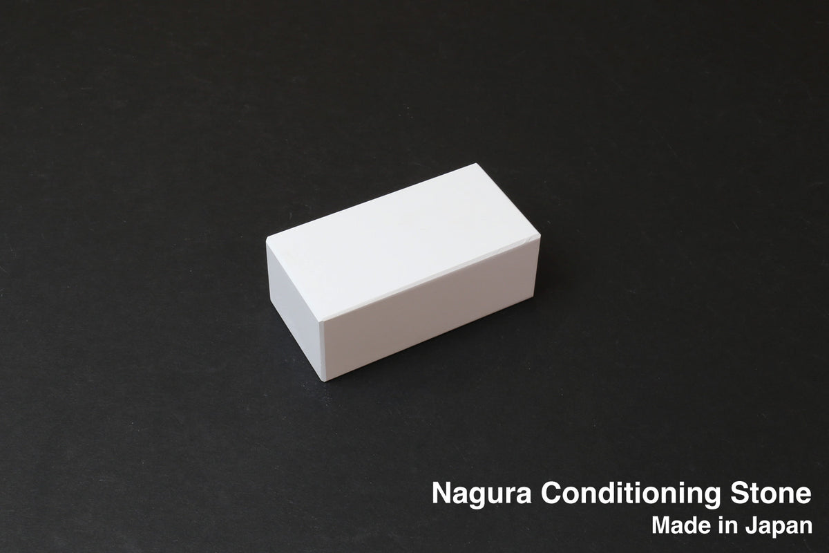 Nagura conditioning stone, small white rectangular block