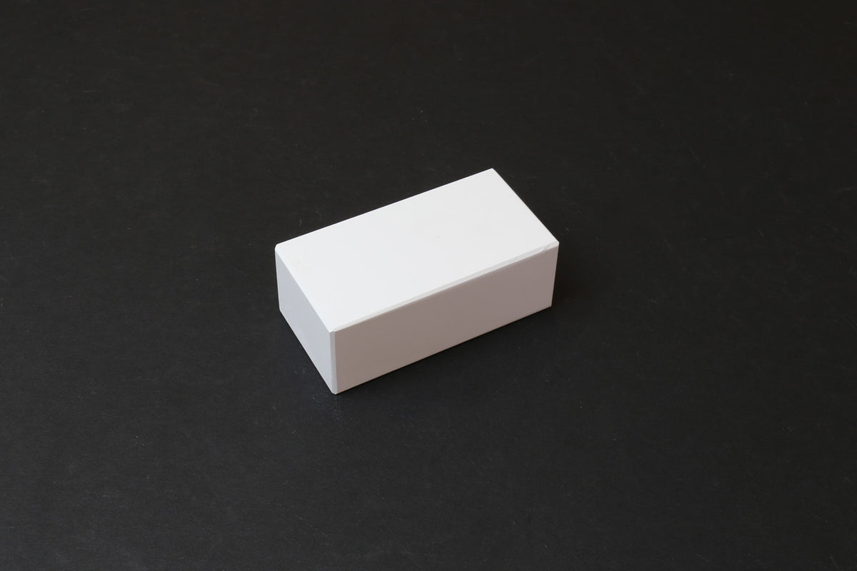 Rectangular white conditioning stone block with smooth edges