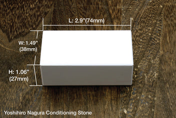 Pink rectangular sharpening stone block with visible size measurements