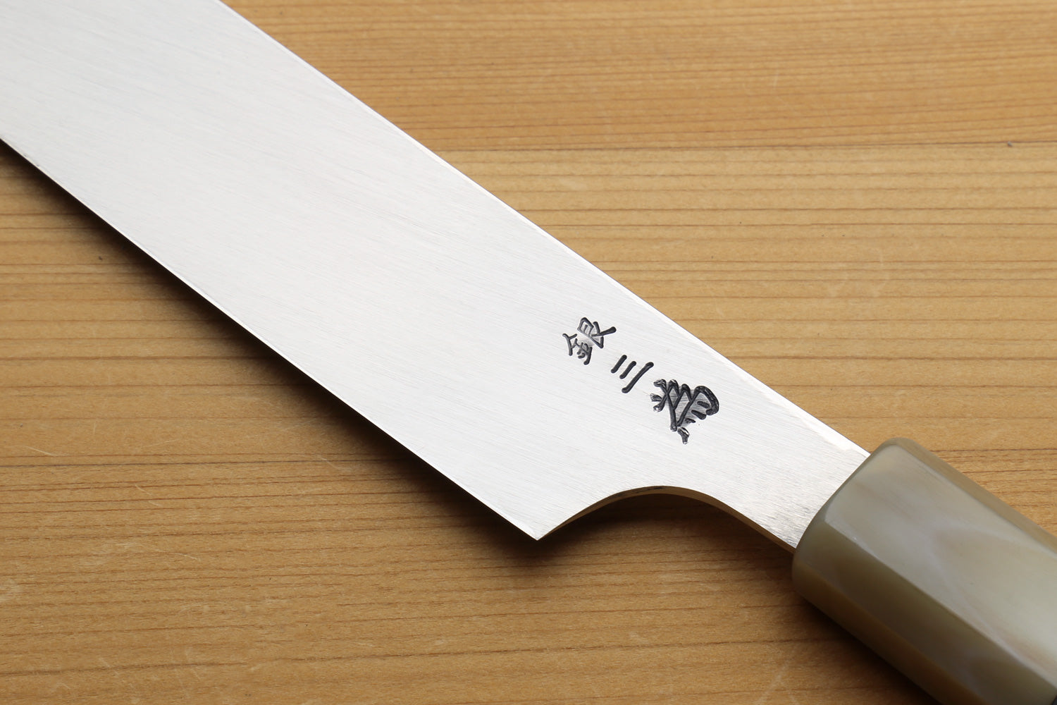 Japanese knife with a brand engraving