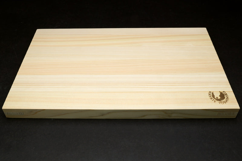 Japanese cypress cutting board side profile with Yoshihiro logo near corner