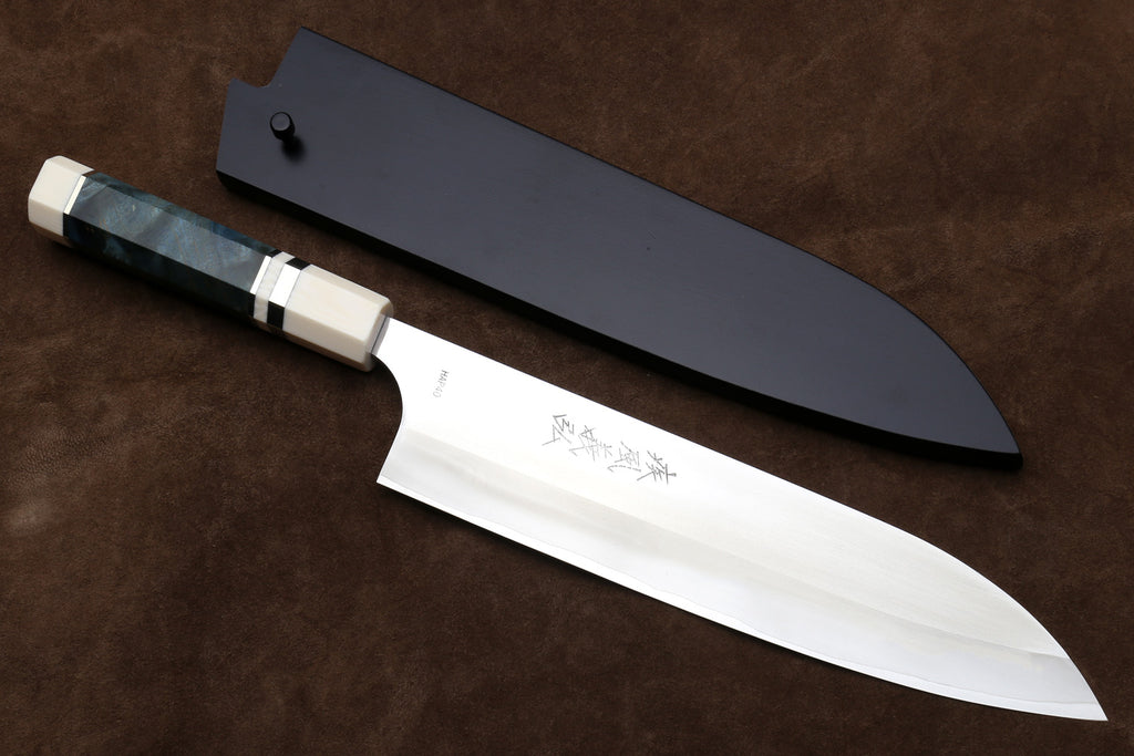 knife with a Lacquered wooden sheath on a brown background