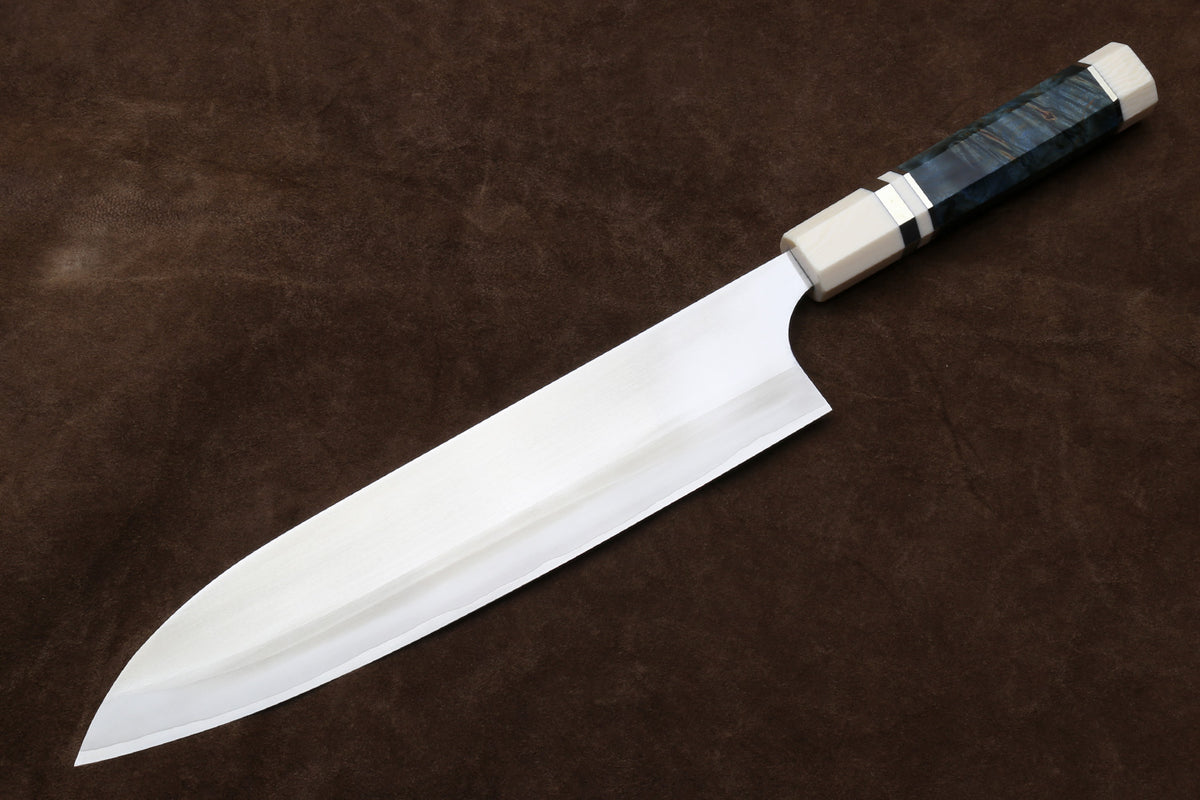Gyuto chef knife with curved edge, silver blade and octagonal ivory handle with dark band