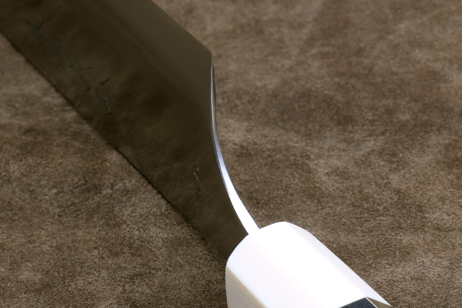 Knife heel on a brown rug