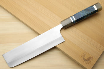 Nakiri chef’s knife with silver blade and ocean blue handle, in magnolia saya