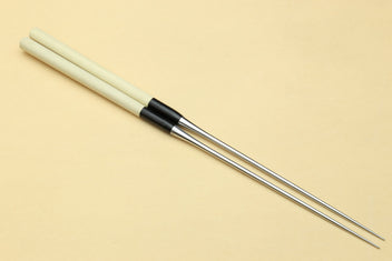 Single sushi plating tweezers with light wooden handle, black band, stainless tips