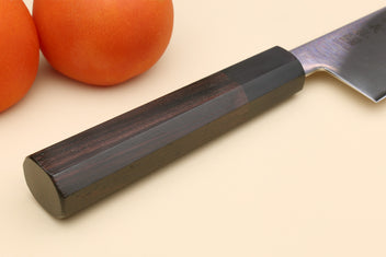 Chef knife with stainless kiritsuke blade and dark rosewood handle, side view