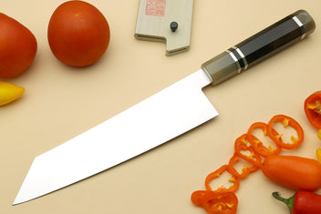Stainless kiritsuke chef knife with dark ebony triple-ring bolster and blade