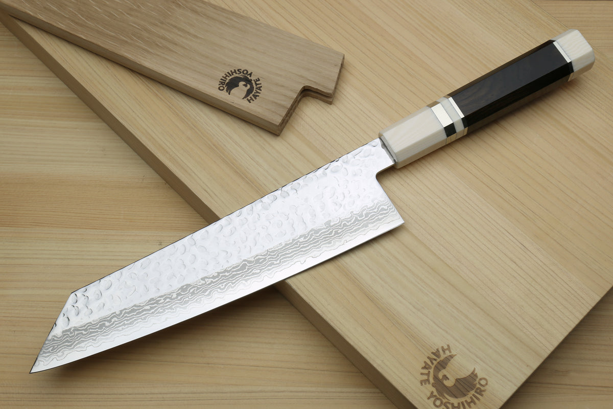 Kiritsuke chef knife with VG-10 hammered Damascus blade and ivory octagonal handle