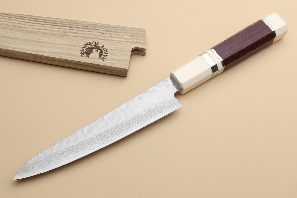 Damascus petty utility knife with ivory handle and hammered steel blade