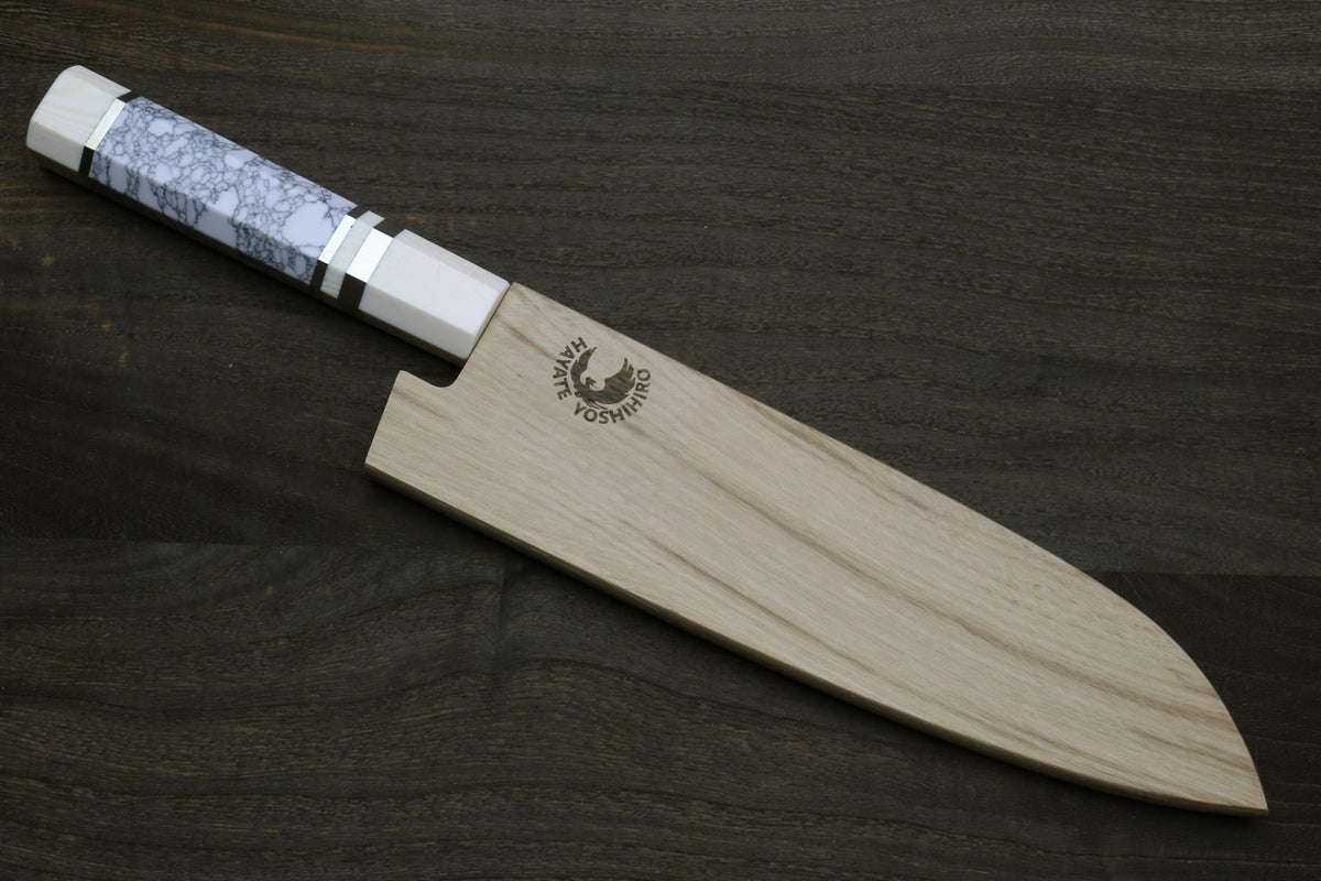 Damascus santoku knife with white howlite handle and ivory-toned bolster, in wooden sheath