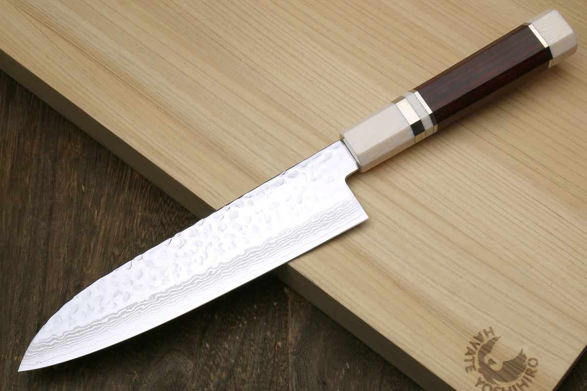 Damascus santoku knife close-up, octagonal rosewood handle with ivory bolster