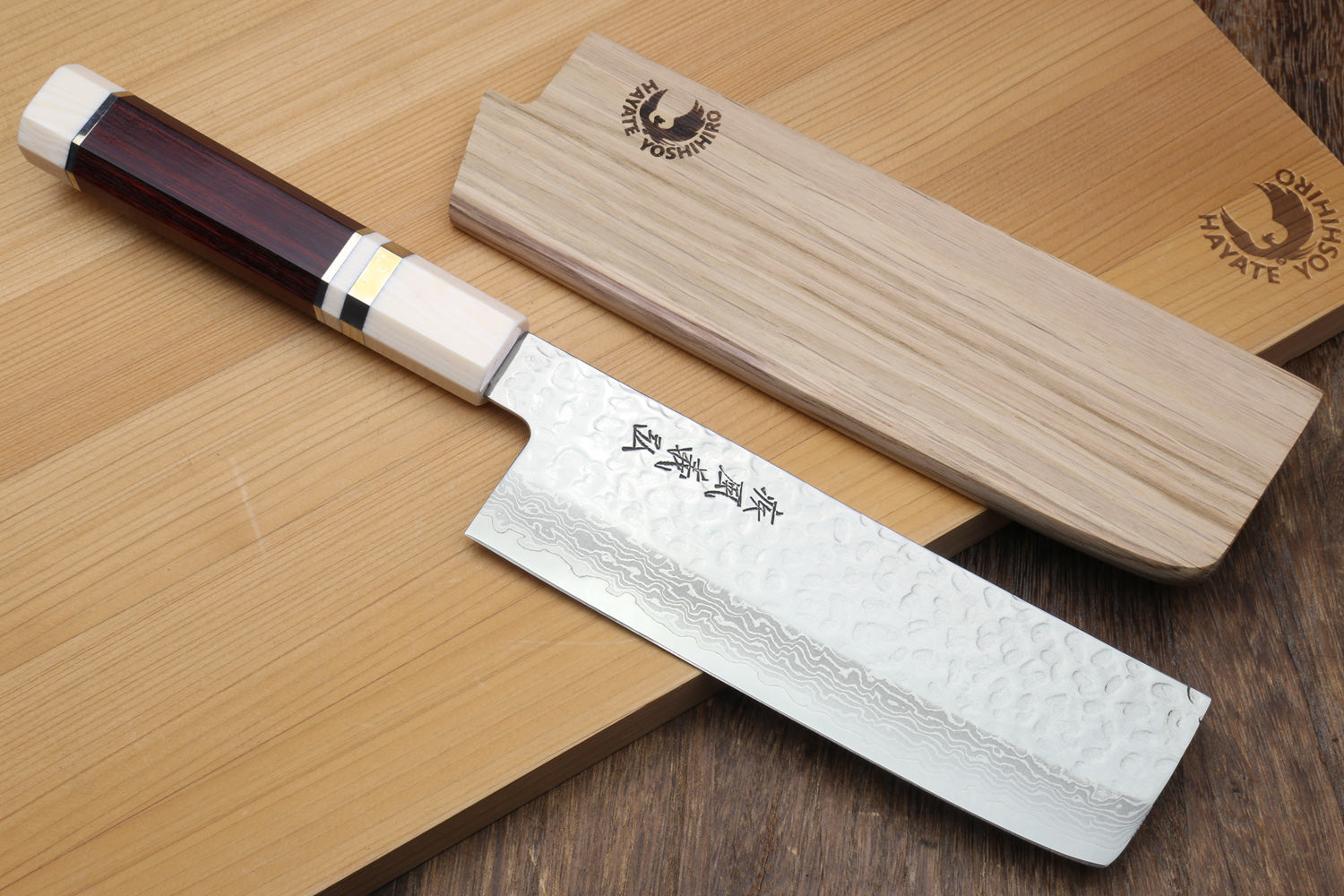 Nakiri vegetable knife with Damascus blade, rosewood handle, and wooden saya cover