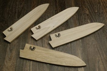 Set of light oak wood saya blade protectors with engraved logos