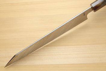 Utility-Kiritsuke chef knife side view with tapered tip and damascus blade