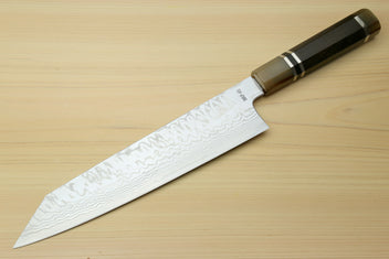 Kiritsuke chef's knife, white damascus blade with wavy pattern and dark octagonal handle