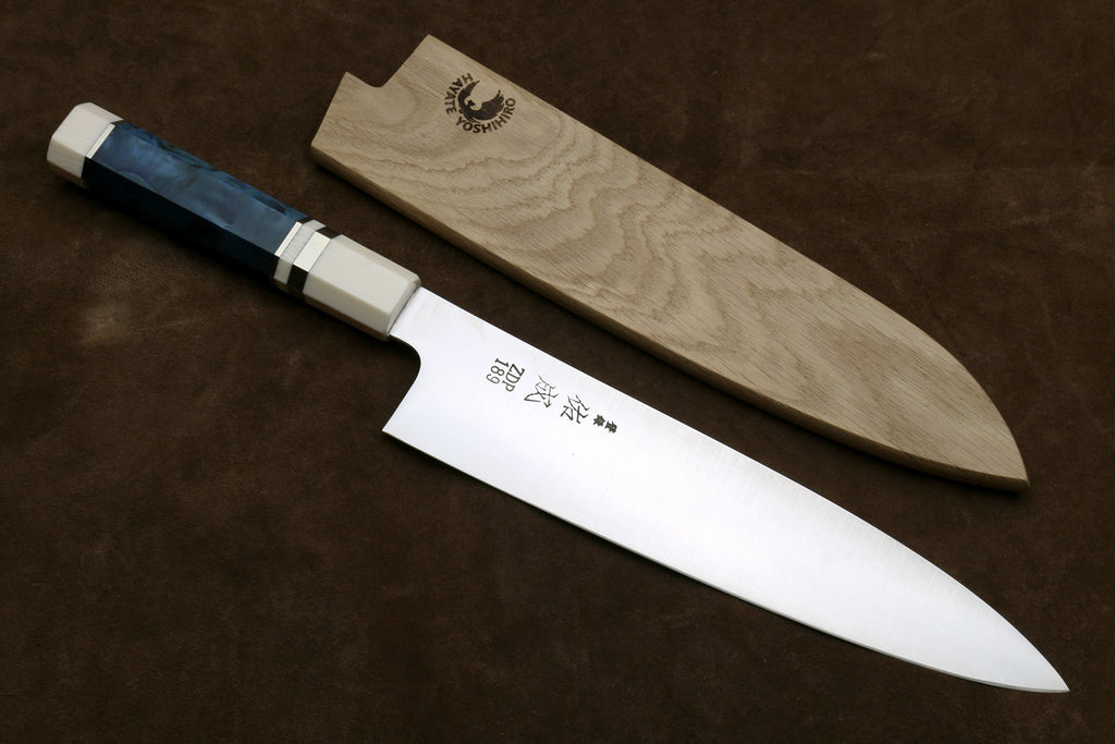 Chef's knife with a sheath on a dark brown background