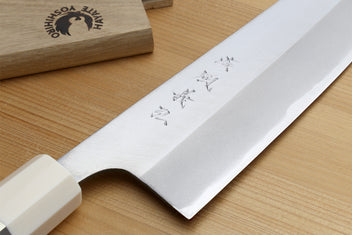 Japanese chef knife, silver blade with etched pattern near tip