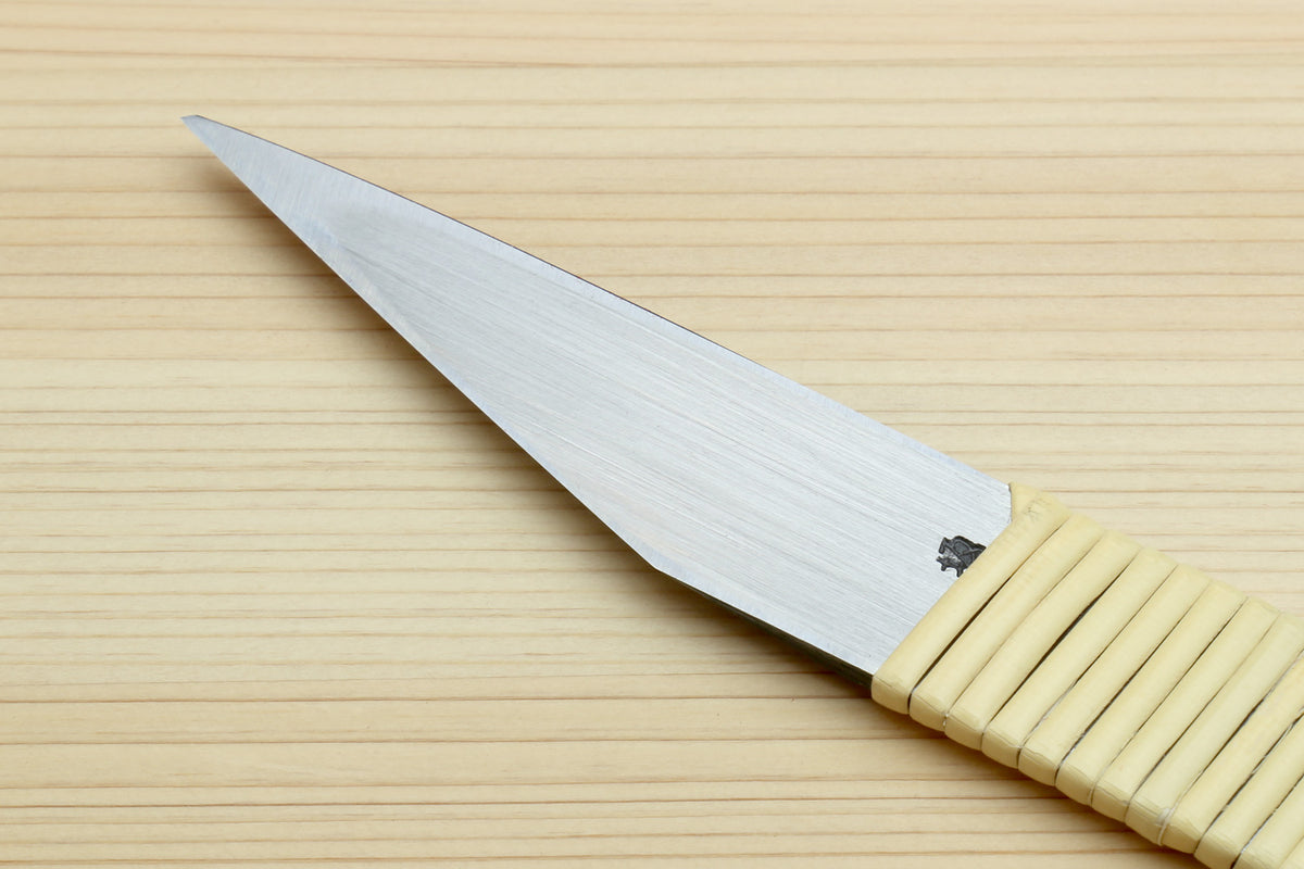 Kiridashi utility knife with long silver blade and ribbed beige handle