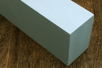 Yoshihiro Toishi 400-grit whetstone sharpening stone, angled side view of light blue block