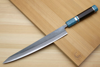 Sujihiki slicer knife with turquoise handle and pointed stainless blade