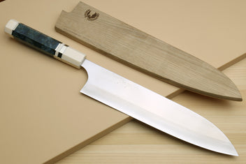 Gyuto chef's knife with blue octagonal handle, ivory bolsters, and wooden sheath