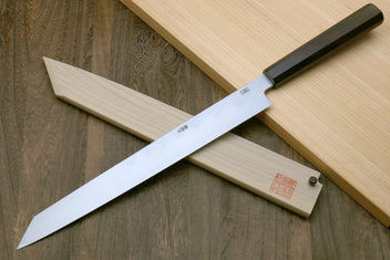 Japanese kiritsuke sushi knife with white blade and black ebony handle