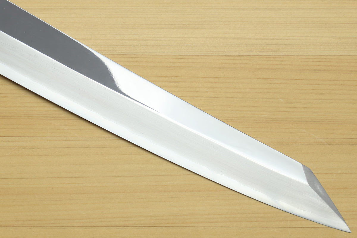 Mirror-finished stainless yanagiba blade with pointed tip and smooth bevel