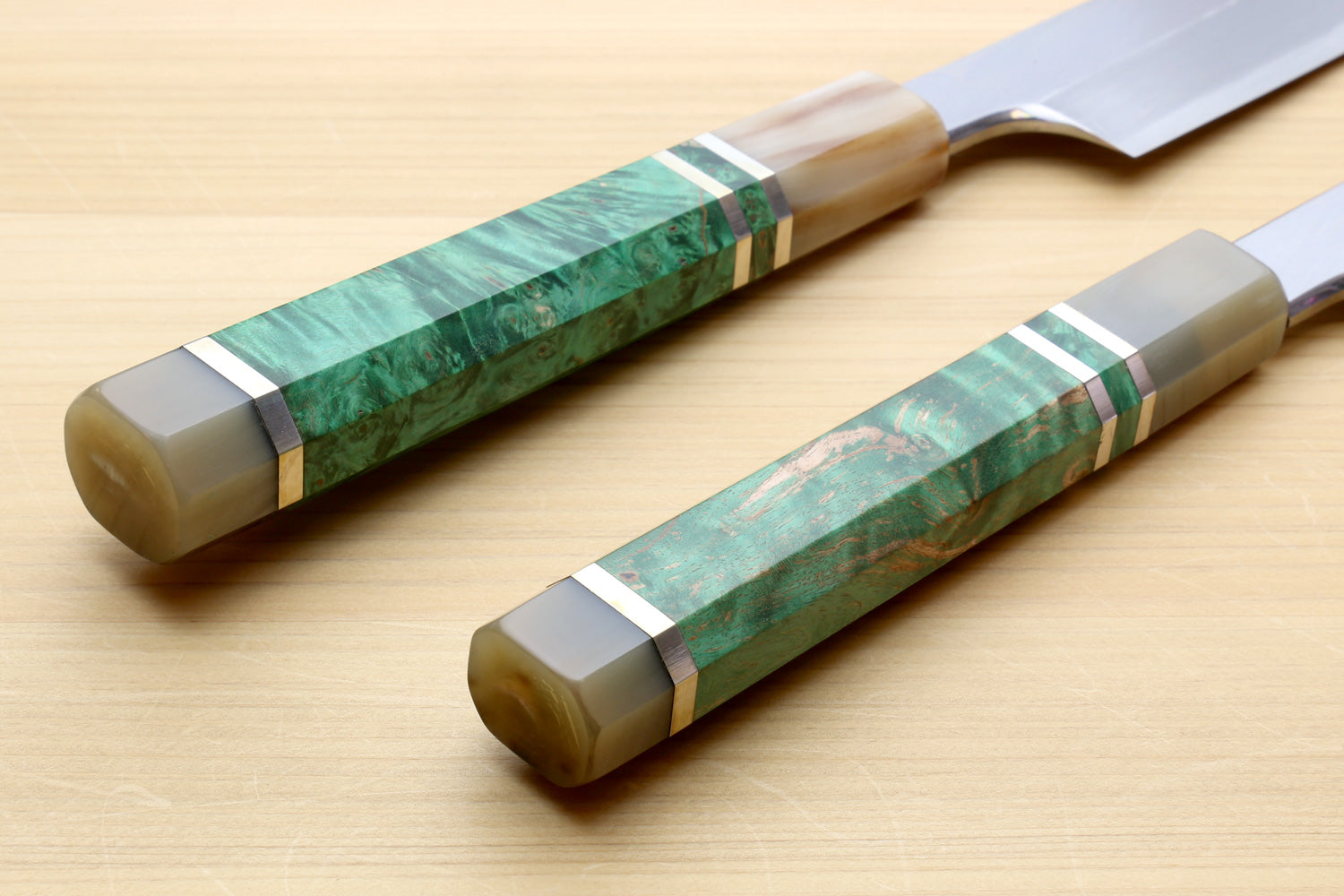 Green handles of the knives