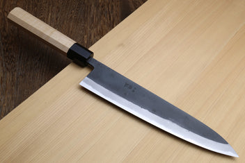 Kurouchi blue steel gyuto knife with light Kaede handle and black collar