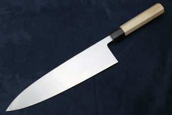 Deba fish fillet knife with plain white blade and light wood handle
