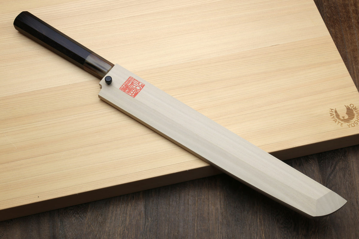 Sashimi sushi knife with white steel blade and dark handle, inside wooden saya
