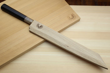 Yanagi-kiritsuke sushi knife with dark bolster, white blade, and light wood handle