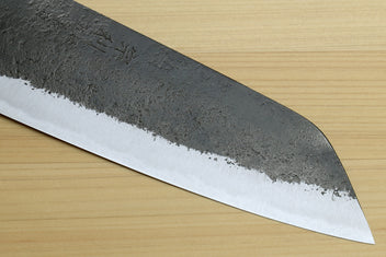 Japanese Bunka chef knife tip and cutting edge with white steel bevel