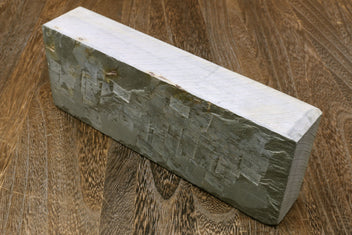 Natural sharpening whetstone, rectangular gray stone with light white edge