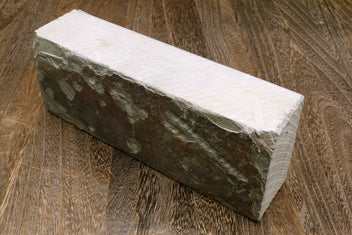 Natural sharpening whetstone, dark green rectangular stone with light top surface