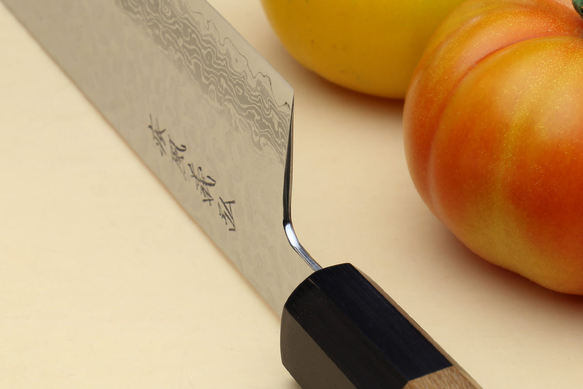 Nakiri vegetable knife with angled cutting edge, hammered Damascus steel, wood handle
