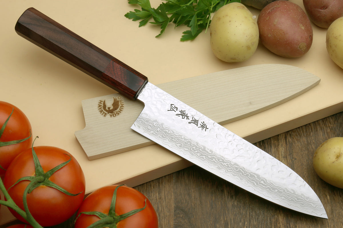 Damascus santoku and petty knives with rosewood handles and pale wood saya covers