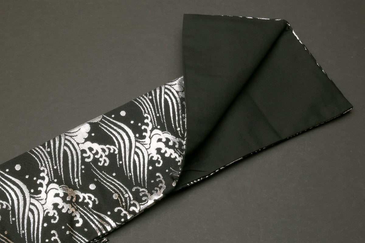 Knife pouch bag open view with black lining and black-and-white wave patterned outer flap
