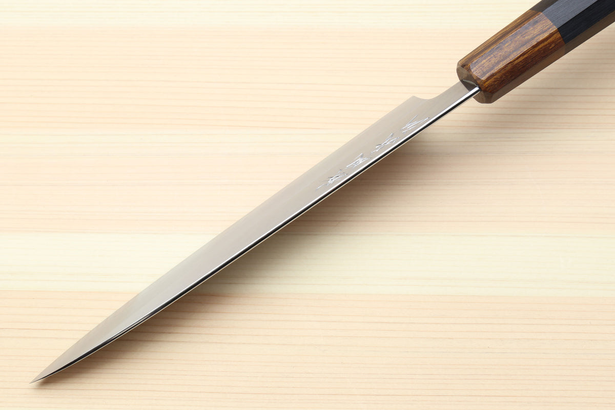Petty utility knife with pointed stainless blade and dark ebony handle