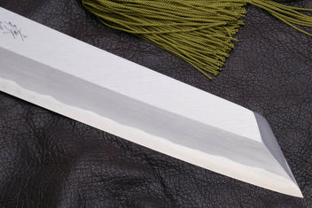 Multipurpose chef knife blade edge close-up on silver steel