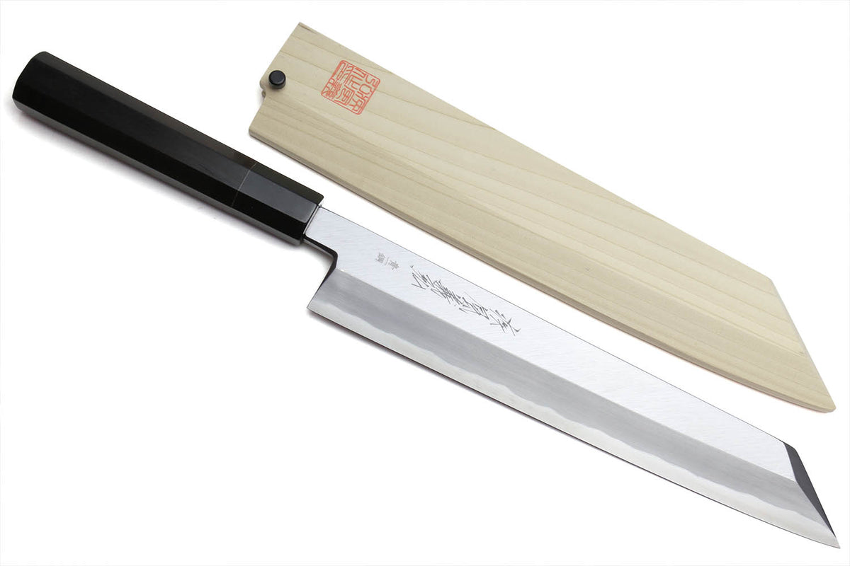 Multipurpose chef knife with silver blade and black handle, light wood sheath