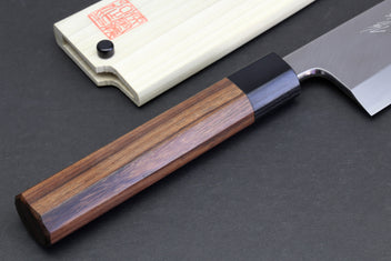 Japanese filet knife with blue-brown wood handle and pale blade on side