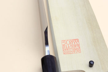 Traditional Japanese garasuki boning knife blade and bolster, dark rosewood handle