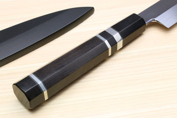 Yanagi sushi knife handle close-up with dark wood, silver rings, and black end cap