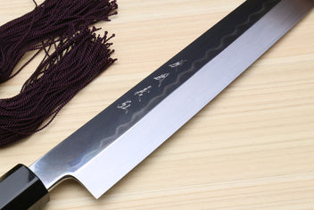 Yoshihiro Japanese sushi knife blade close-up, mirror silver finish, ebony handle