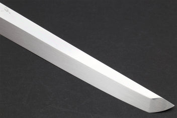 Mirror-finished sushi knife blade with pointed tip and smooth edge.